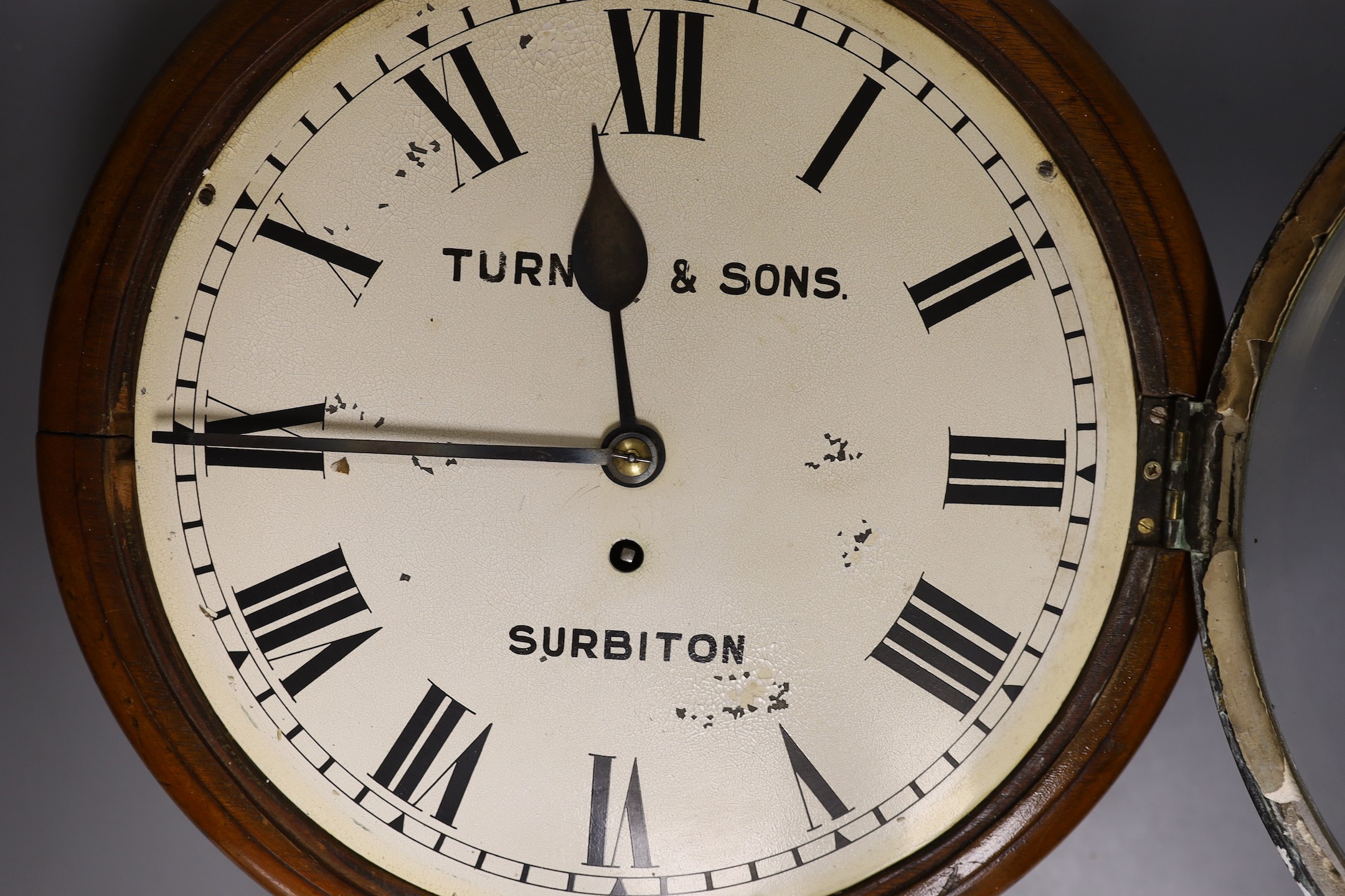 A Turner & Sons circular mahogany single fusee wall clock